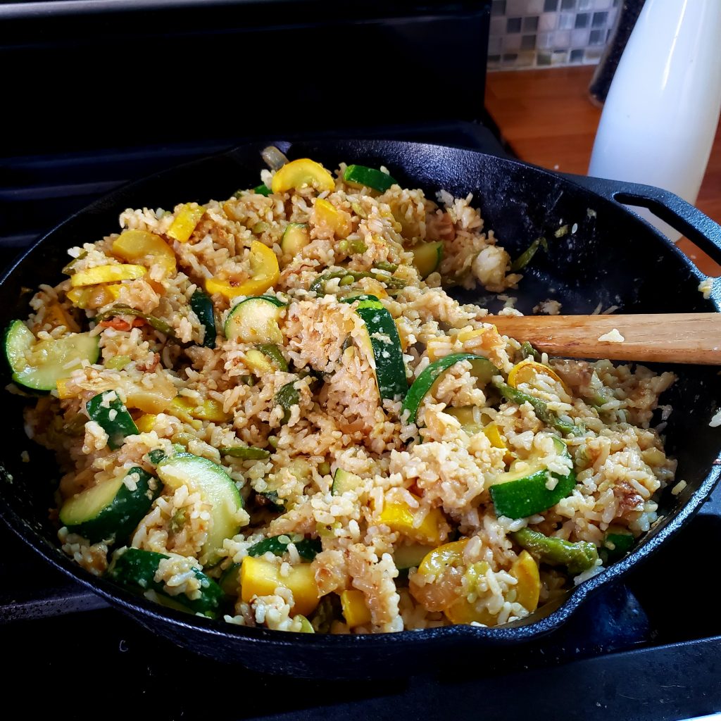 cast iron pan full of fried rice