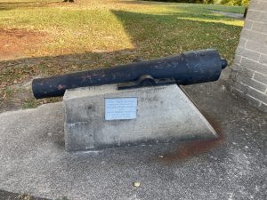 The cannon on the left. The plaque reads "the twin sisters, replicas donated by thomas howes shartle, and reth kinney shartle, native ohioans, adopted texans"