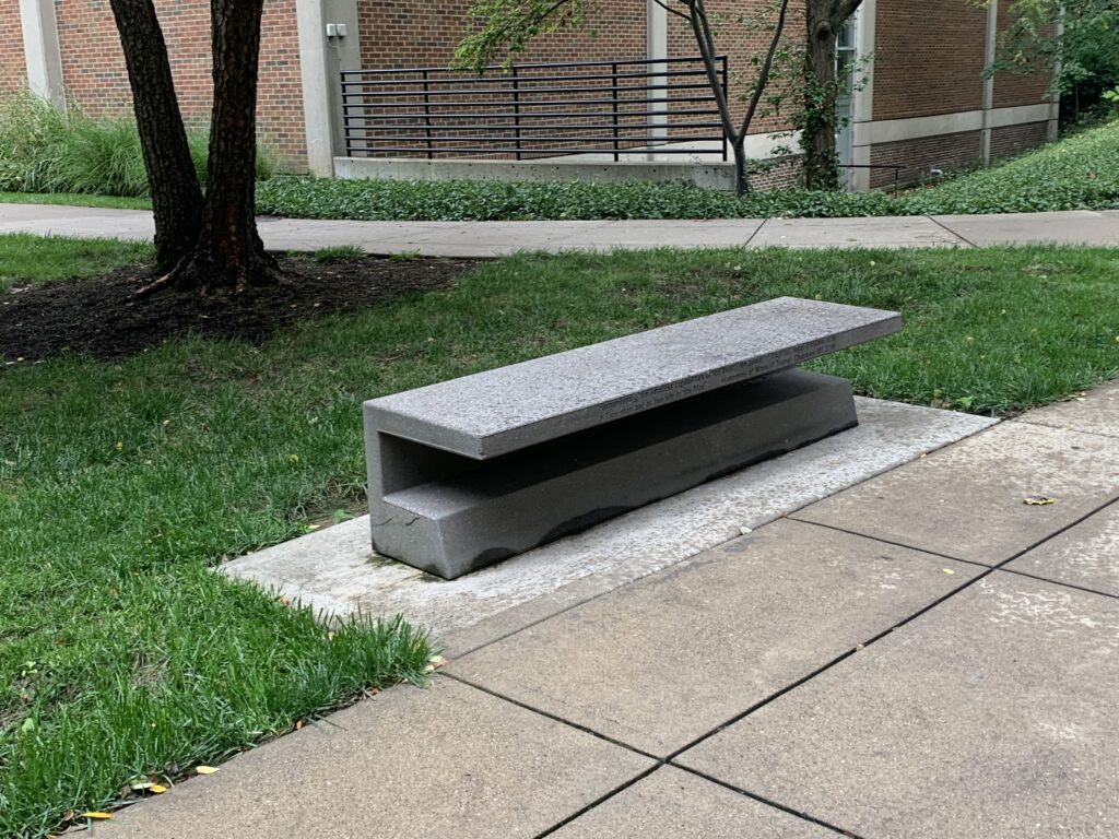 A downward view of the Maxwell Truman Chamber's bench.