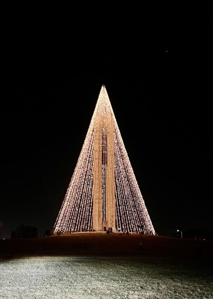 This is the Deeds Carillon but during the holidays. The park has strung lights off of the structure forming a Christmas tree.