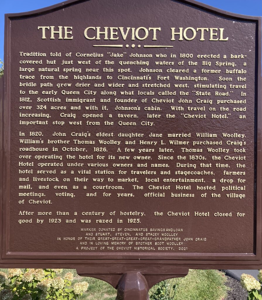 A brown sign titled "The Cheviot Hotel."