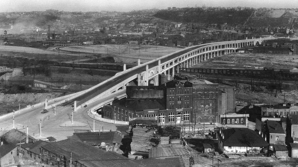 Looking east over the Western Hills Viaduct shortly after completion, showing the Camp Washington Rail Yard.