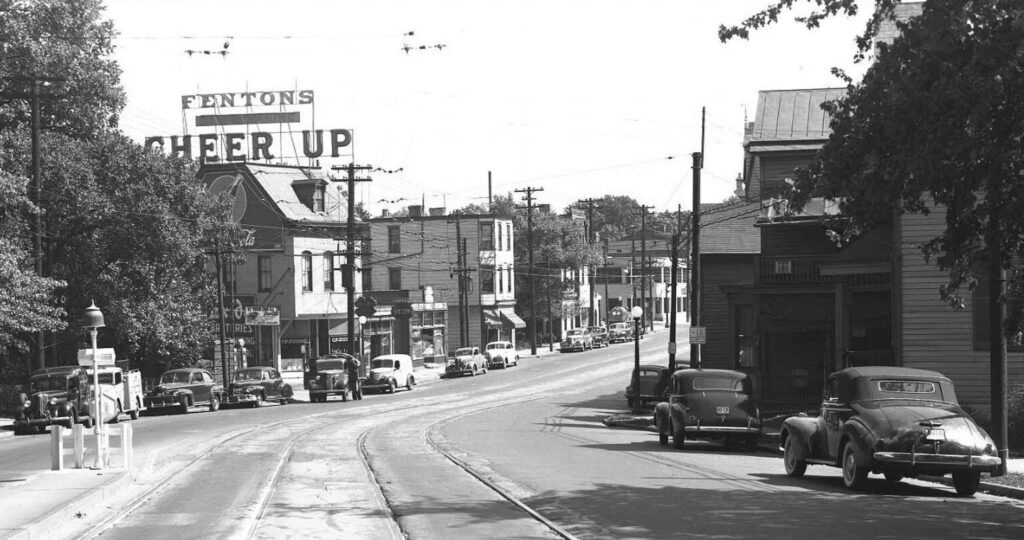 Early shot of Madison road showing a yellow lamp in use at a streetcar stop, Ca 1945
