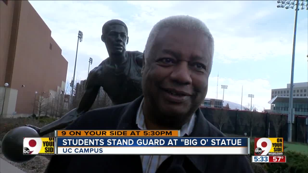 Media Coverage of Oscar Robertson visiting  UC to honor three UC students that stood guard  in order to prevent vandalism of the statue by Xavier University students in the spirit of competition.
