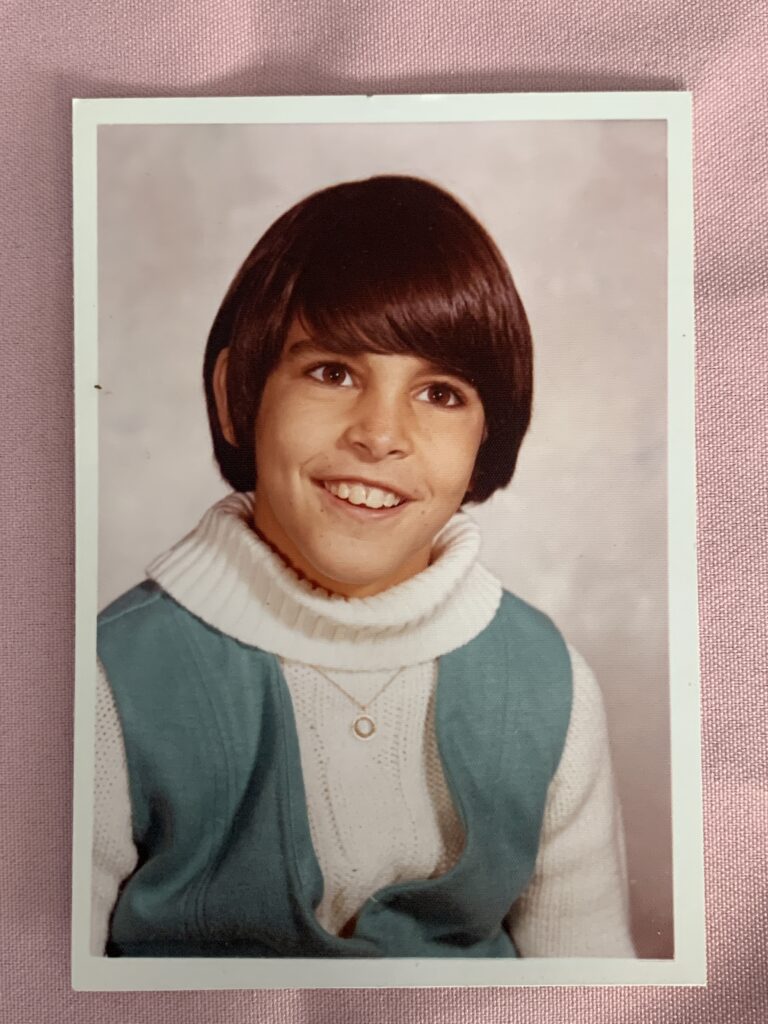 Randolph's 6th grade school photo, mid 1970s, with a bowl style haircut.