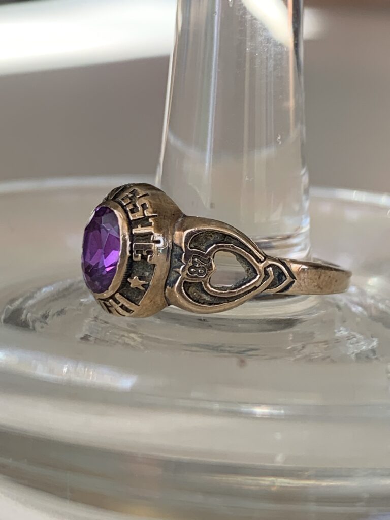 Side view of ring, showing heart shape design motif