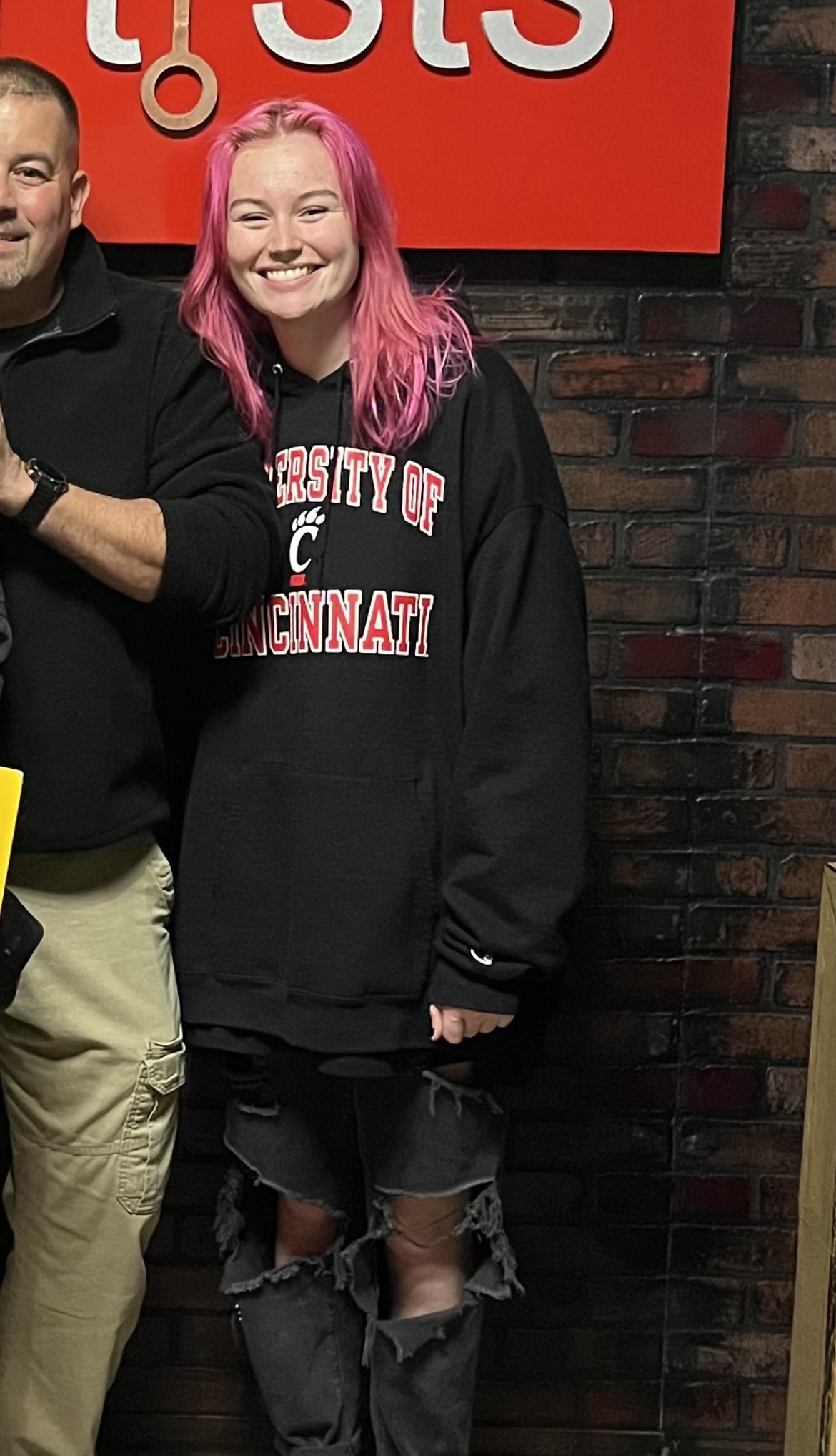 Lauren Massaro wearing a University of Cincinnati sweatshirt