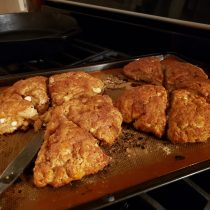 pan of scones with cinnamon on top